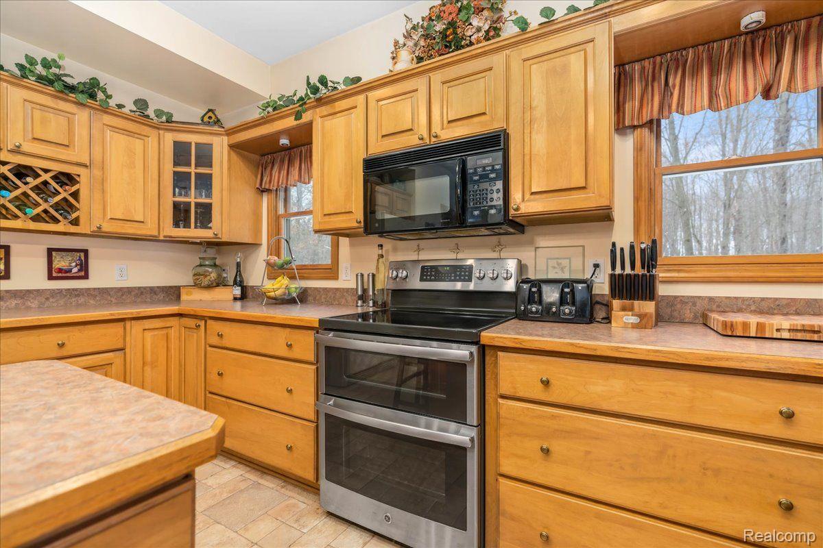 21851 Prince Road Belleville, MI 48111 - Photo 15 of 59 Double oven and built-in wine storage