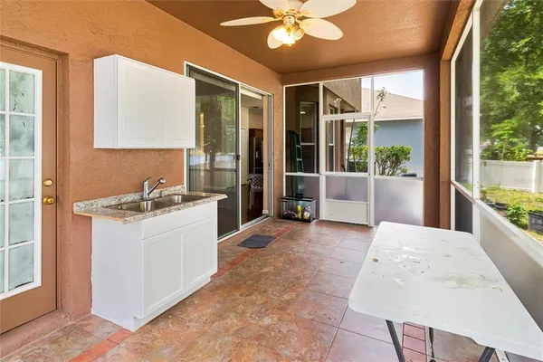 a view of a kitchen with granite countertop furniture and a large window