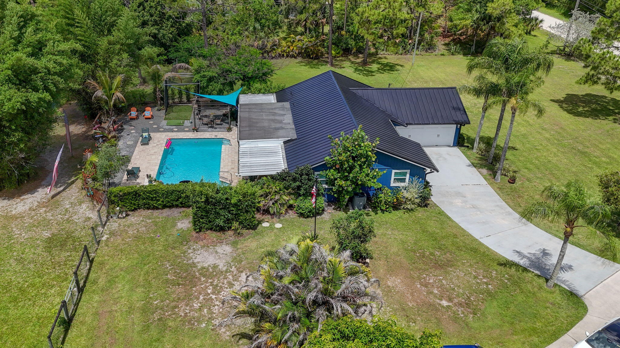 12558 165th Road North Jupiter, FL 33478 - Photo 54 of 67 an aerial view of a house