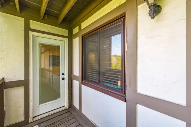 a view of a balcony from a door