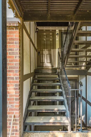 a view of entryway with a front door