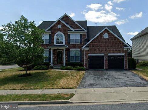 100 Sunlight Drive Frederick, MD 21702 - Photo 1 of 1 a front view of a house with a yard