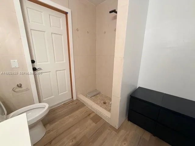 a bathroom with a sink and toilet