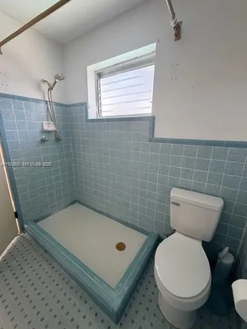 a bathroom with a toilet