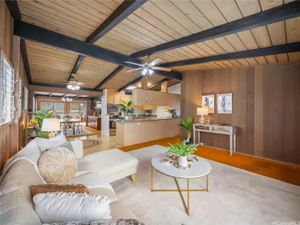 a living room with furniture and a table