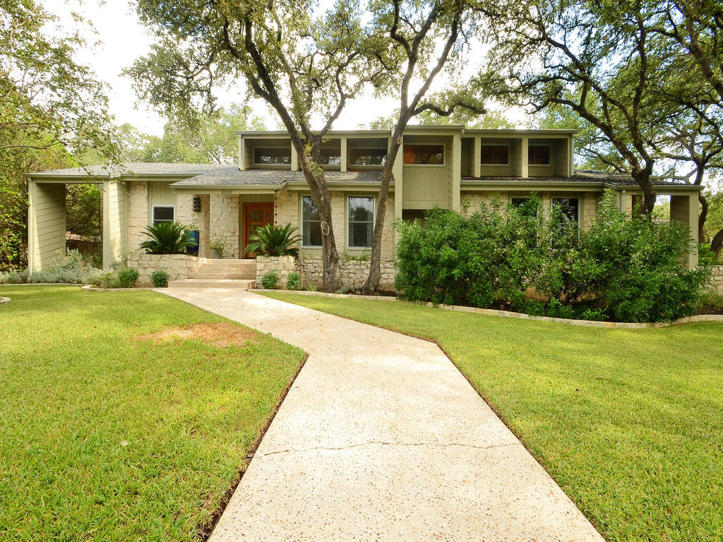 3900 Sidehill Path Austin, TX 78731 - Photo 1 of 1 a front view of a house with a yard