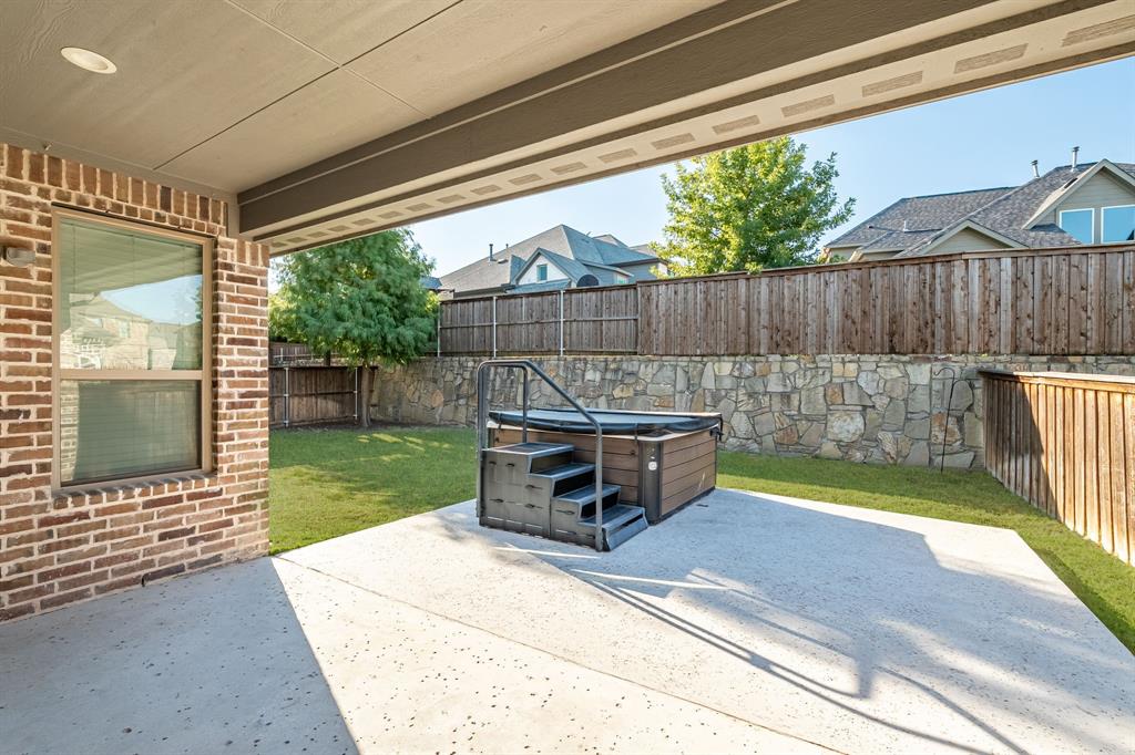 1506 Mariners Hope Way Wylie, TX 75098 - Photo 25 of 28 a view of a backyard with sitting area and furniture