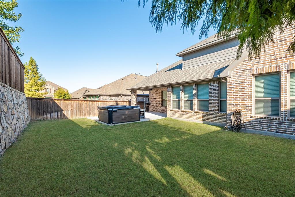 1506 Mariners Hope Way Wylie, TX 75098 - Photo 26 of 28 a view of a house with a yard and sitting area
