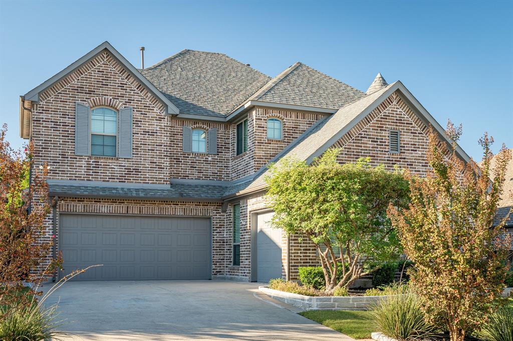 1506 Mariners Hope Way Wylie, TX 75098 - Photo 3 of 28 a front view of a house with garden