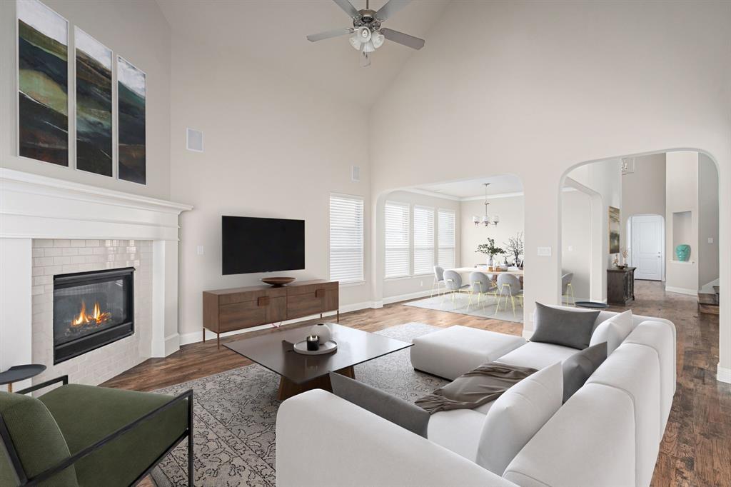 1506 Mariners Hope Way Wylie, TX 75098 - Photo 8 of 28 a living room with furniture and a fireplace