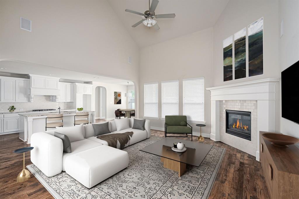 1506 Mariners Hope Way Wylie, TX 75098 - Photo 9 of 28 a living room with furniture fireplace and a table