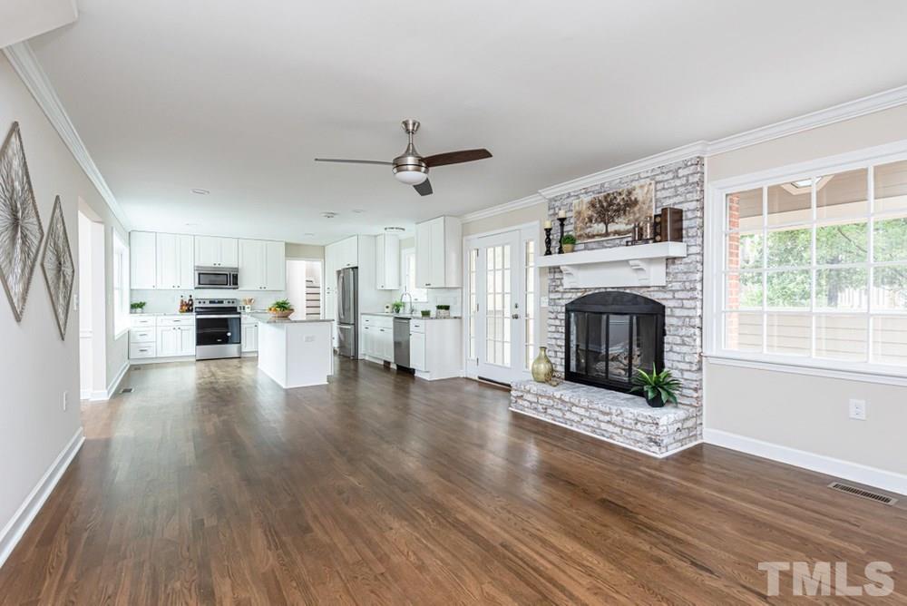 1701 Pony Run Road Raleigh, NC 27615 - Photo 29 of 30 View of open concept floor plan; Family Room into Kitchen.