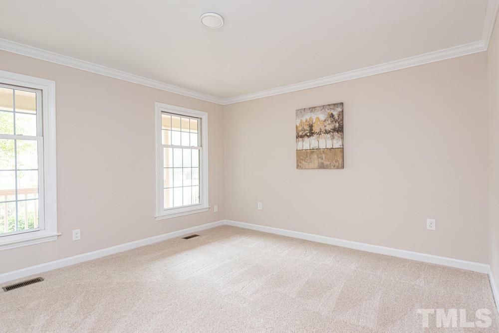 1701 Pony Run Road Raleigh, NC 27615 - Photo 14 of 30 First Floor Bedroom with double windows and nice sized closet