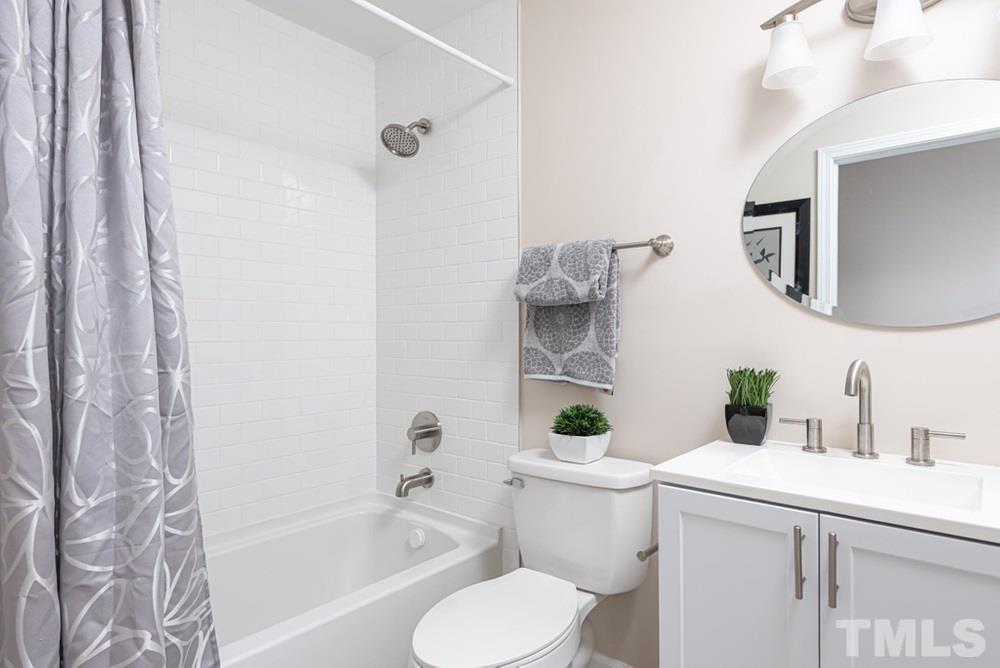 1701 Pony Run Road Raleigh, NC 27615 - Photo 16 of 30 Full Bath on main floor hallway with tub/shower.