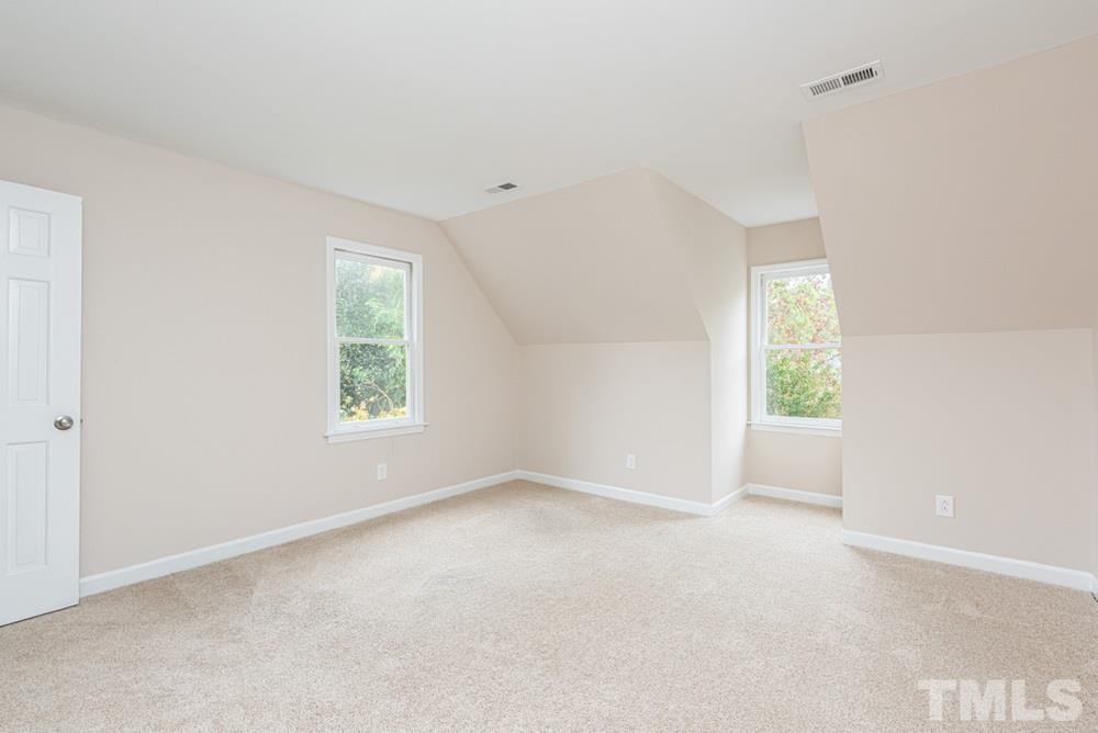 1701 Pony Run Road Raleigh, NC 27615 - Photo 19 of 30 Bedroom 4 with two windows, walkin closet, and access to walk in attic storage.