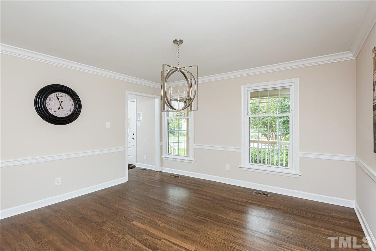 1701 Pony Run Road Raleigh, NC 27615 - Photo 6 of 30 Large front windows with beautiful view of the front yard.