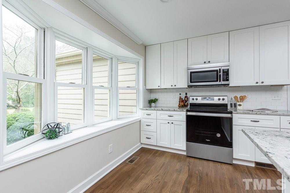 1701 Pony Run Road Raleigh, NC 27615 - Photo 9 of 30 Gorgeous bay window in Kitchen overlooks front yard.
