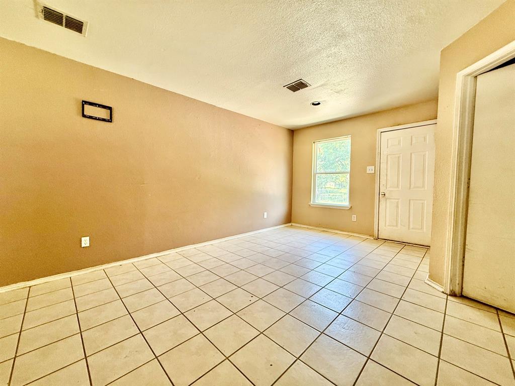 1144 Switchgrass Lane Crowley, TX 76036 - Photo 4 of 17 a view of an empty room