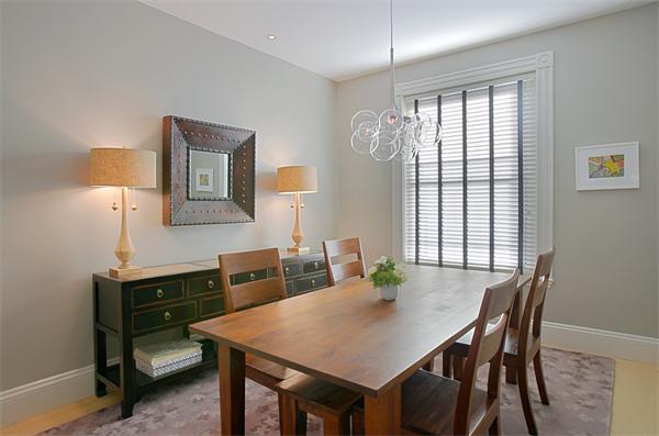 15 Warren Avenue, Unit 7 Boston, MA 02116 - Photo 3 of 9 a view of a dining room with furniture and window