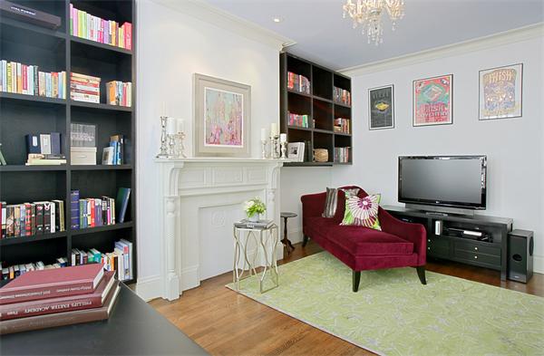 15 Warren Avenue, Unit 7 Boston, MA 02116 - Photo 4 of 9 a living room with furniture and a flat screen tv