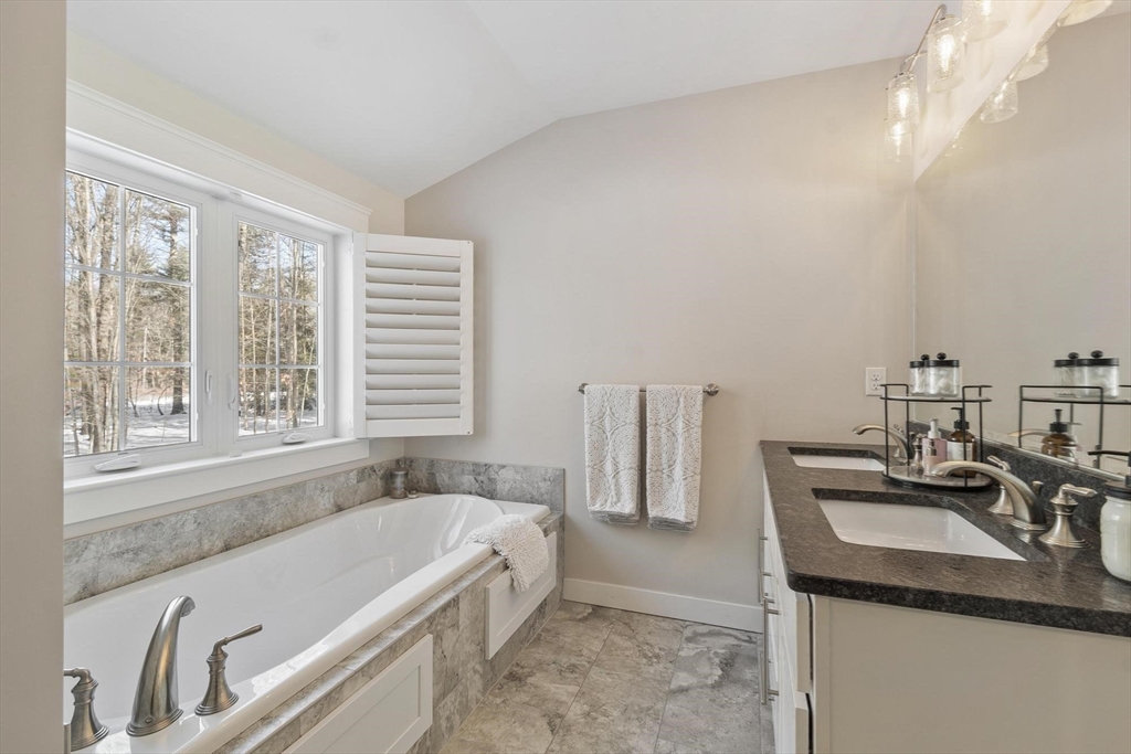 3 Swett Drive Hampton, NH 03842 - Photo 12 of 42 a bath tub sitting next to a window