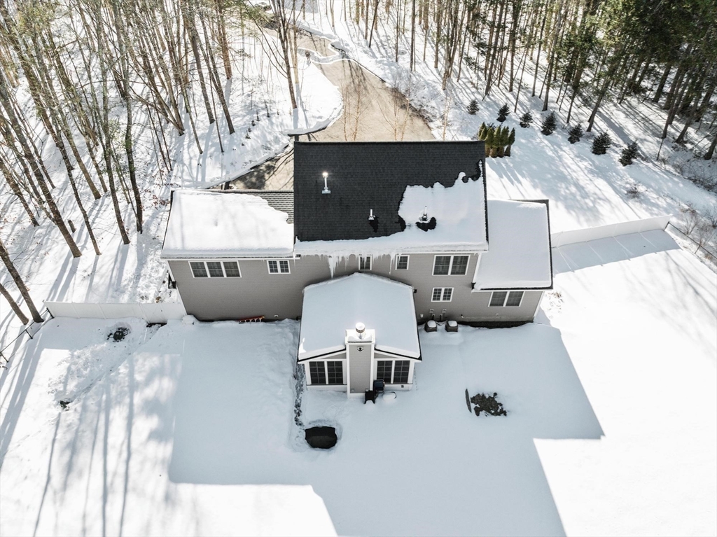 3 Swett Drive Hampton, NH 03842 - Photo 2 of 42 a view of living room with furniture and kitchen view