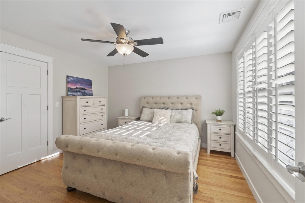 3 Swett Drive Hampton, NH 03842 - Photo 21 of 42 a bedroom with a bed and a window