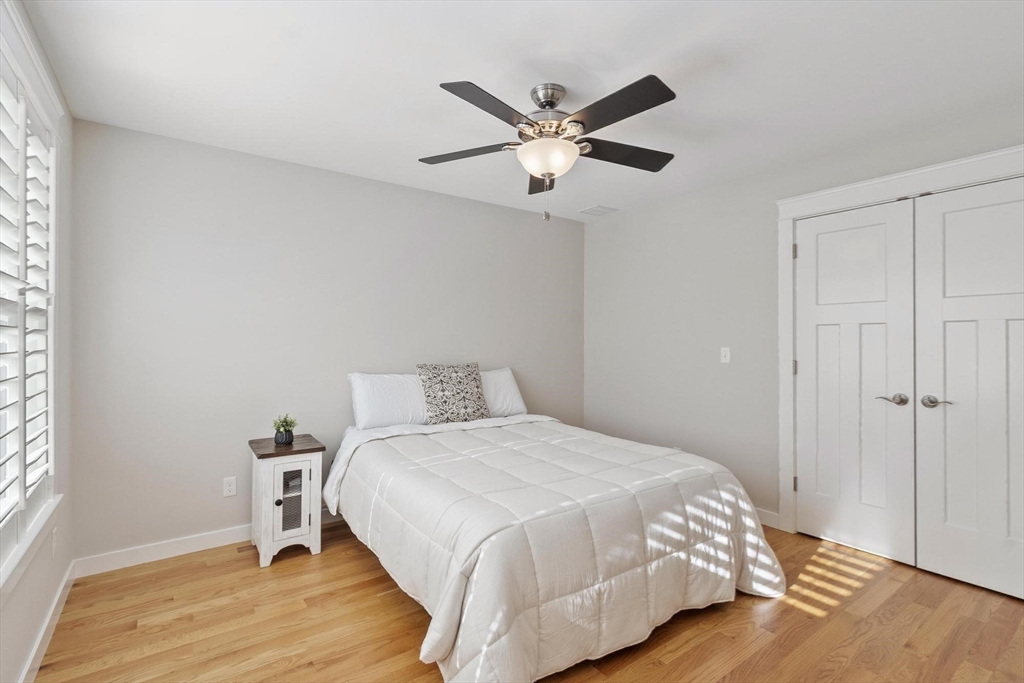 3 Swett Drive Hampton, NH 03842 - Photo 24 of 42 a bedroom with a bed and a window