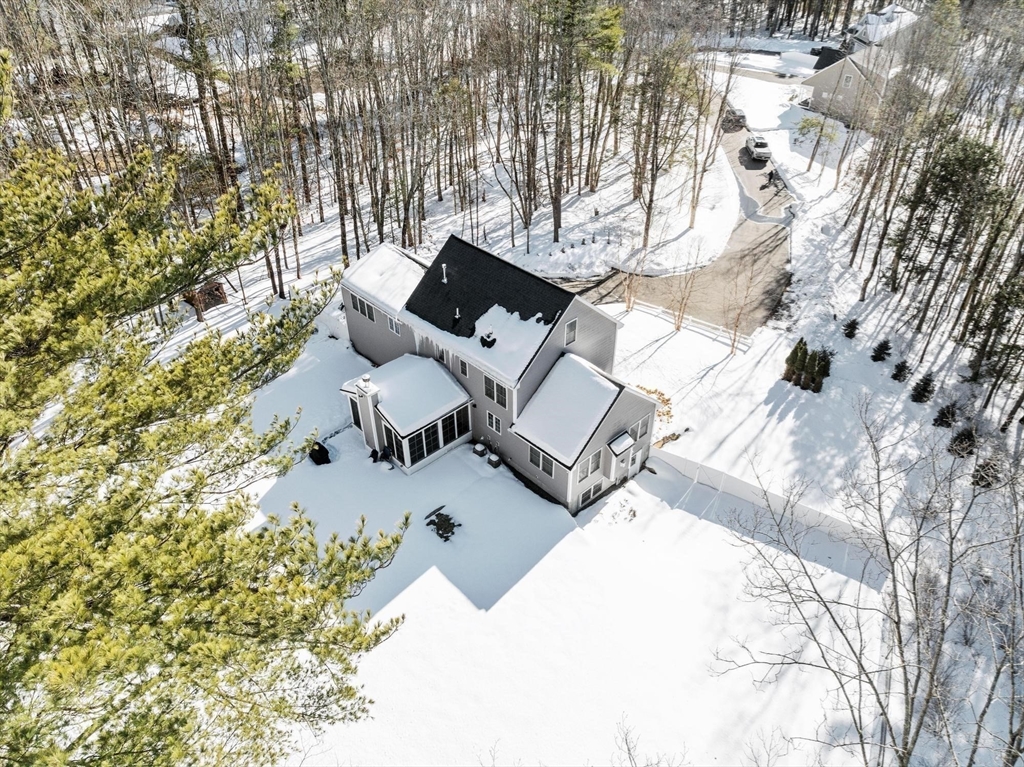 3 Swett Drive Hampton, NH 03842 - Photo 38 of 42 a view of a terrace with chairs and a large tree