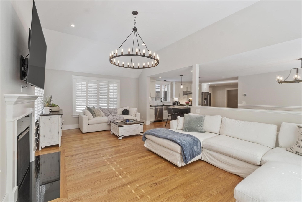 3 Swett Drive Hampton, NH 03842 - Photo 6 of 42 a living room with fireplace furniture and a flat screen tv