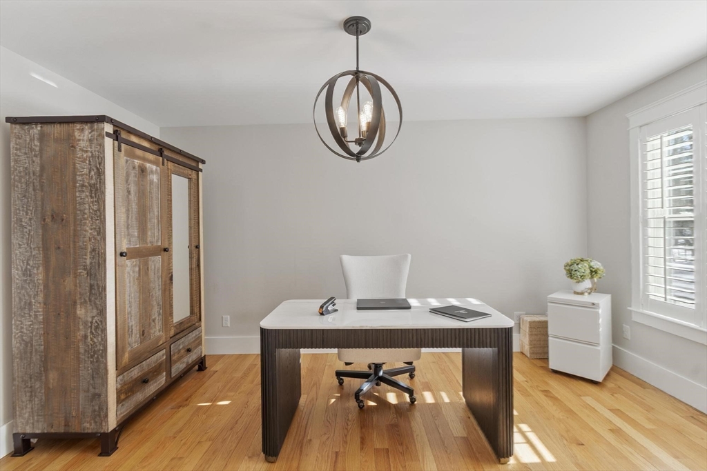3 Swett Drive Hampton, NH 03842 - Photo 9 of 42 a view of a room with furniture window and wooden floor