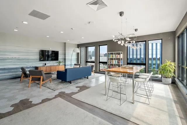 a view of a livingroom with furniture and window