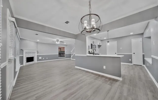 a view of kitchen and windows