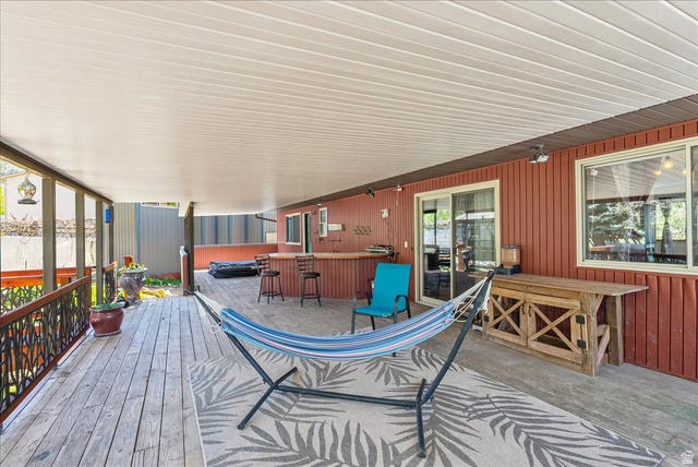11 South Clark Lane Elk Ridge, UT 84651 - Photo 37 of 46 Deck with a hot tub and a patio