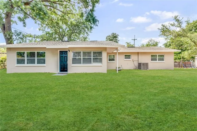 a house view with a garden space