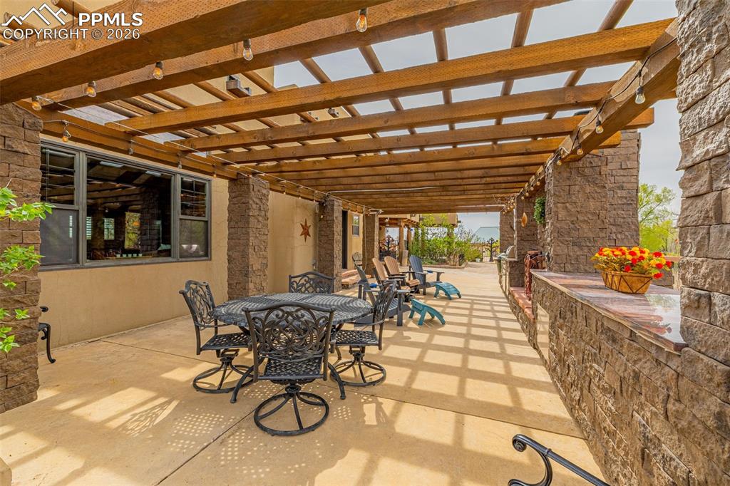 11960 Old Pueblo Road Fountain, CO 80817 - Photo 11 of 50 a view of a swimming pool with outdoor seating