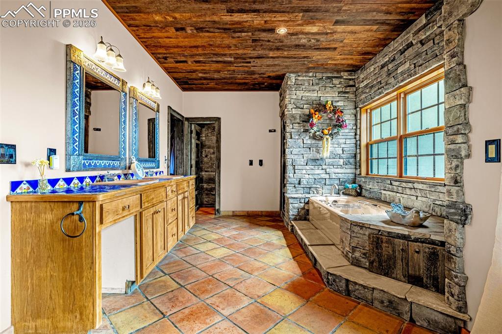 11960 Old Pueblo Road Fountain, CO 80817 - Photo 28 of 50 a kitchen that has a lot of cabinets in it