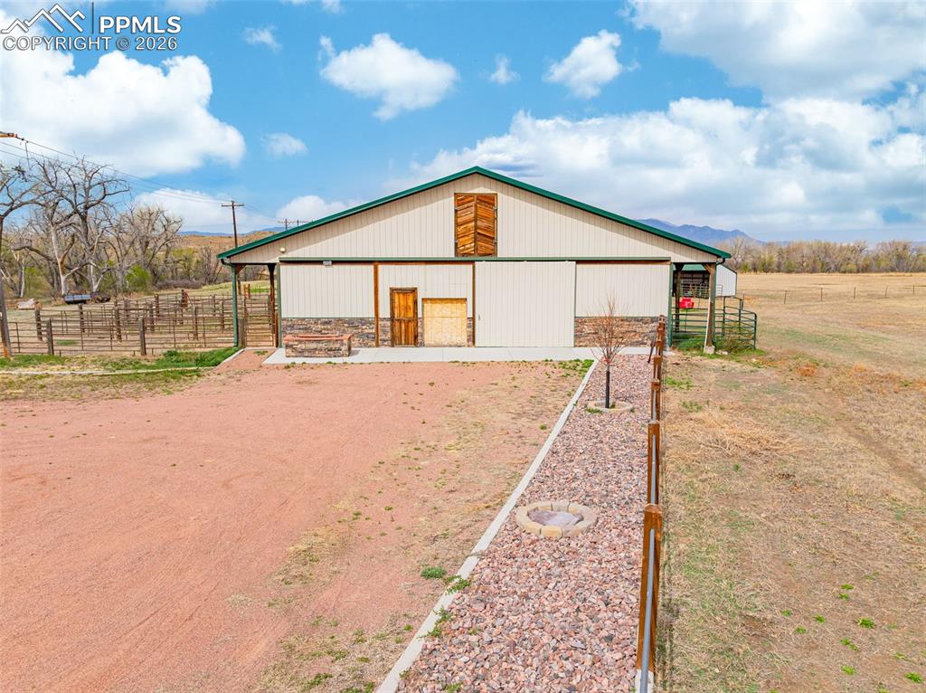 11960 Old Pueblo Road Fountain, CO 80817 - Photo 36 of 50 a view of backyard of house and car parked