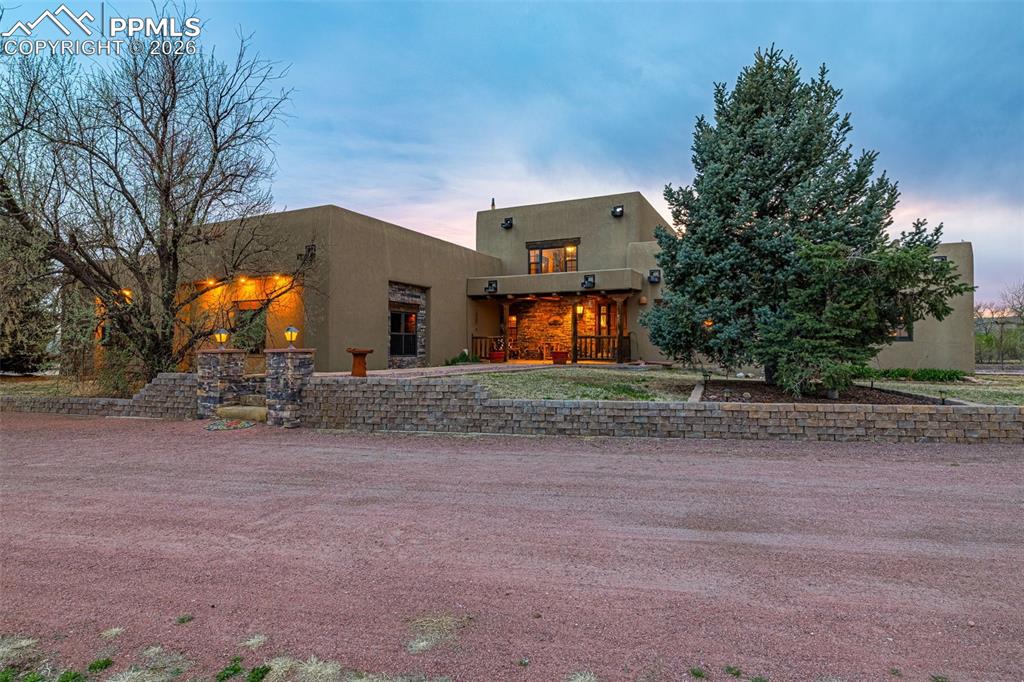11960 Old Pueblo Road Fountain, CO 80817 - Photo 45 of 50 a front view of a house with a yard