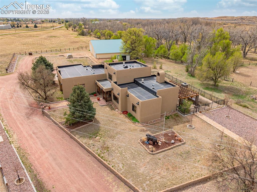 11960 Old Pueblo Road Fountain, CO 80817 - Photo 8 of 50 an aerial view of a house with a ocean view
