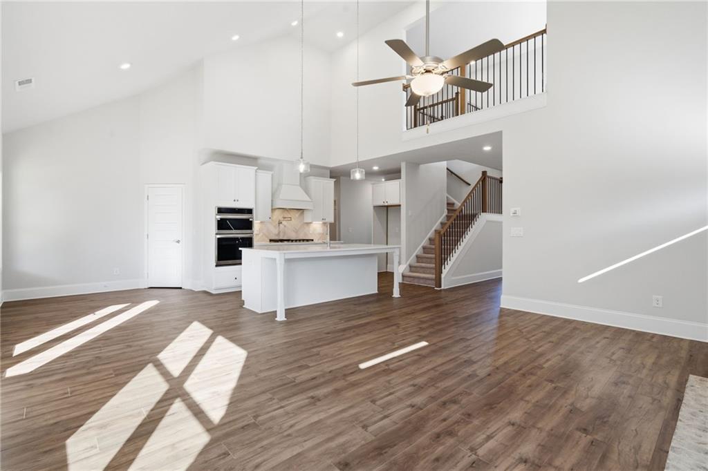 2540 Parkside Way Gainesville, GA 30507 - Photo 13 of 53 a view of kitchen and hall with wooden floor