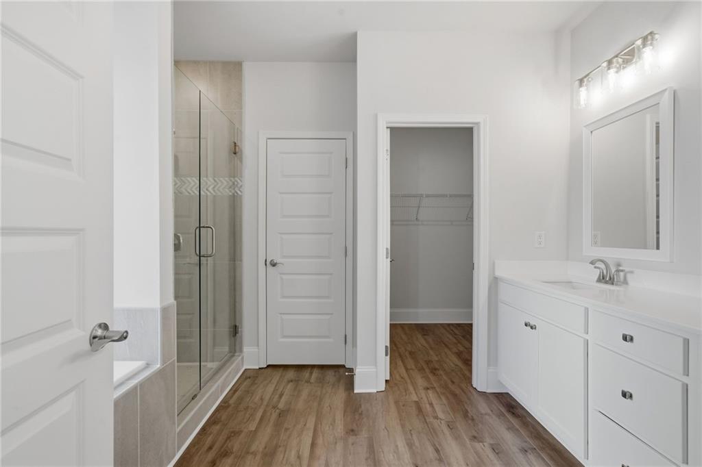 2540 Parkside Way Gainesville, GA 30507 - Photo 26 of 53 a bathroom with a sink and a mirror
