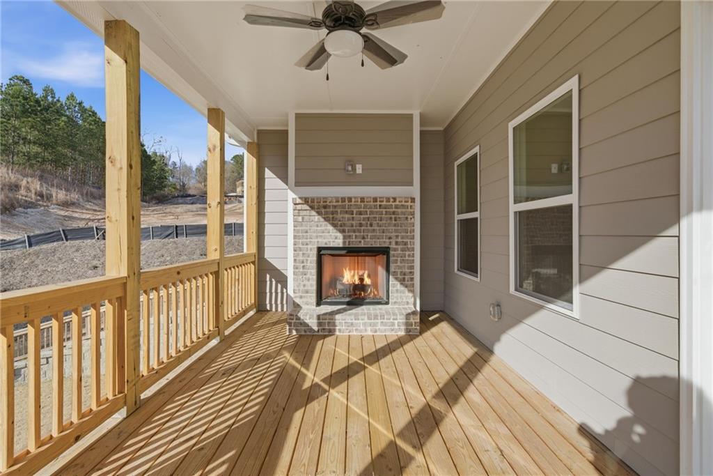 2540 Parkside Way Gainesville, GA 30507 - Photo 30 of 53 a view of a balcony with a fireplace