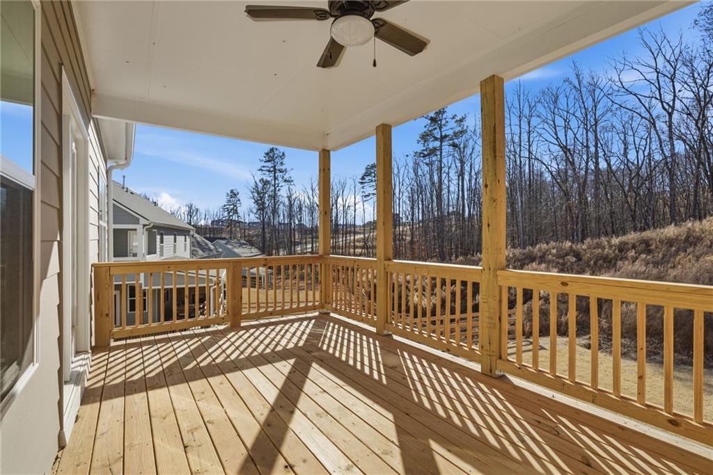 2540 Parkside Way Gainesville, GA 30507 - Photo 31 of 53 a view of a porch with wooden floor