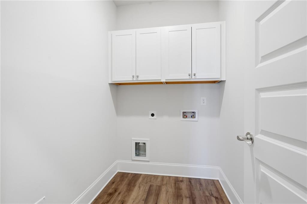 2540 Parkside Way Gainesville, GA 30507 - Photo 38 of 53 a view of walk in closet with wooden floor