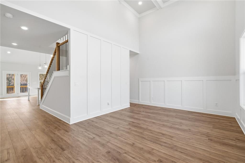 2540 Parkside Way Gainesville, GA 30507 - Photo 9 of 53 a view of a hallway with wooden floor