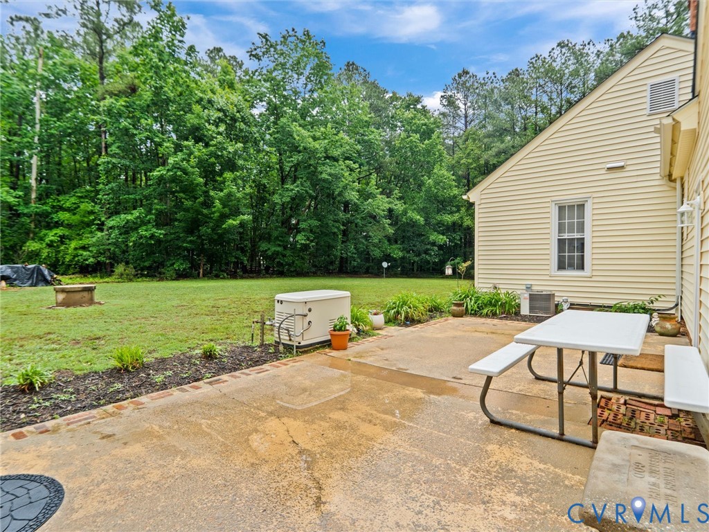 3420 State Rte 656 Powhatan, VA 23139 - Photo 33 of 37 a view of a house with backyard and a sitting area