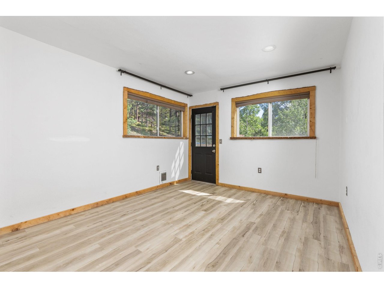 665 Lower Travis Gulch Road Black Hawk, CO 80422 - Photo 24 of 47 Primary features a LVP floor and private balcony- upper level