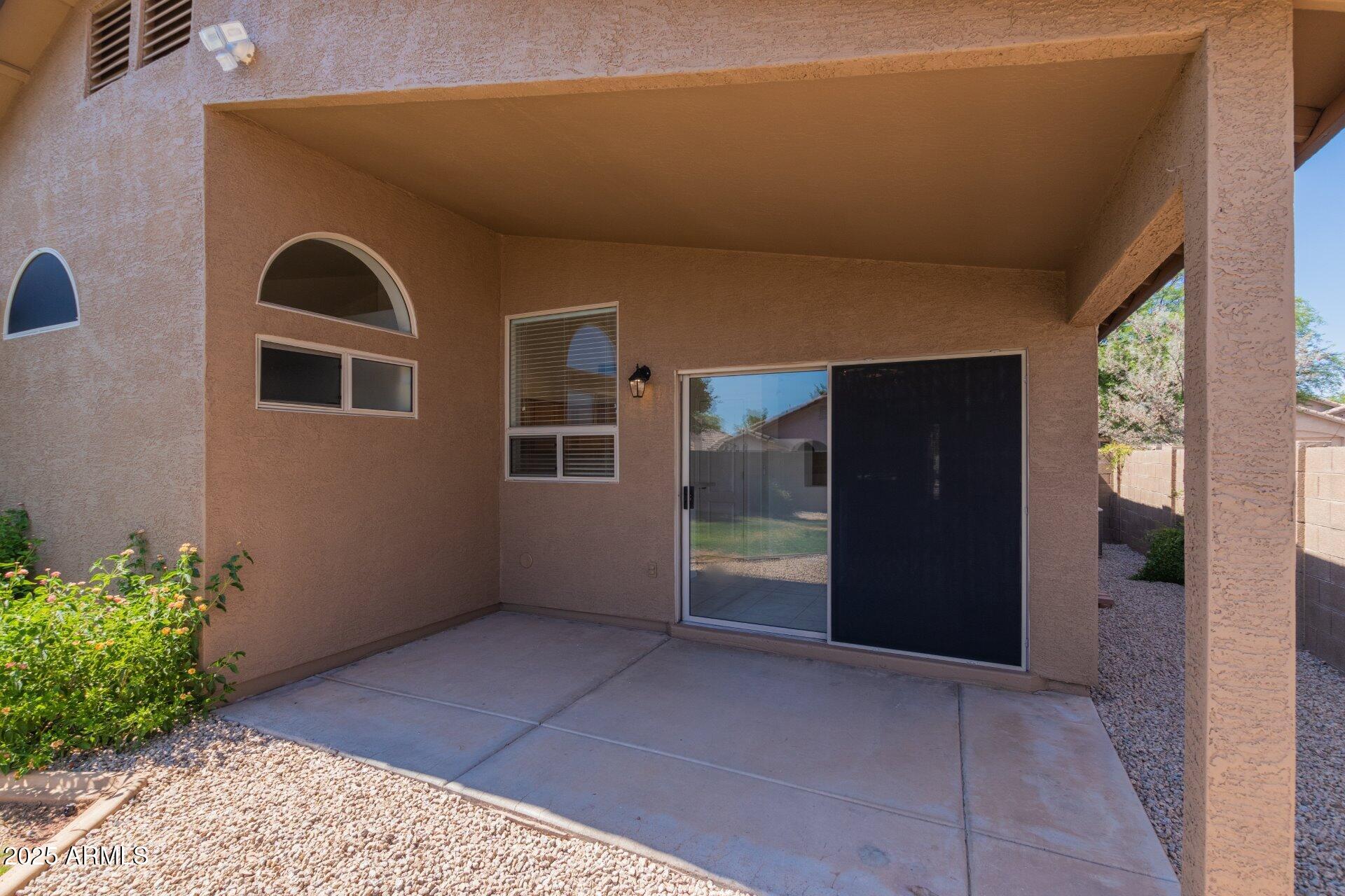 4443 East Rowel Road Phoenix, AZ 85050 - Photo 22 of 25 a view of an empty room with a window