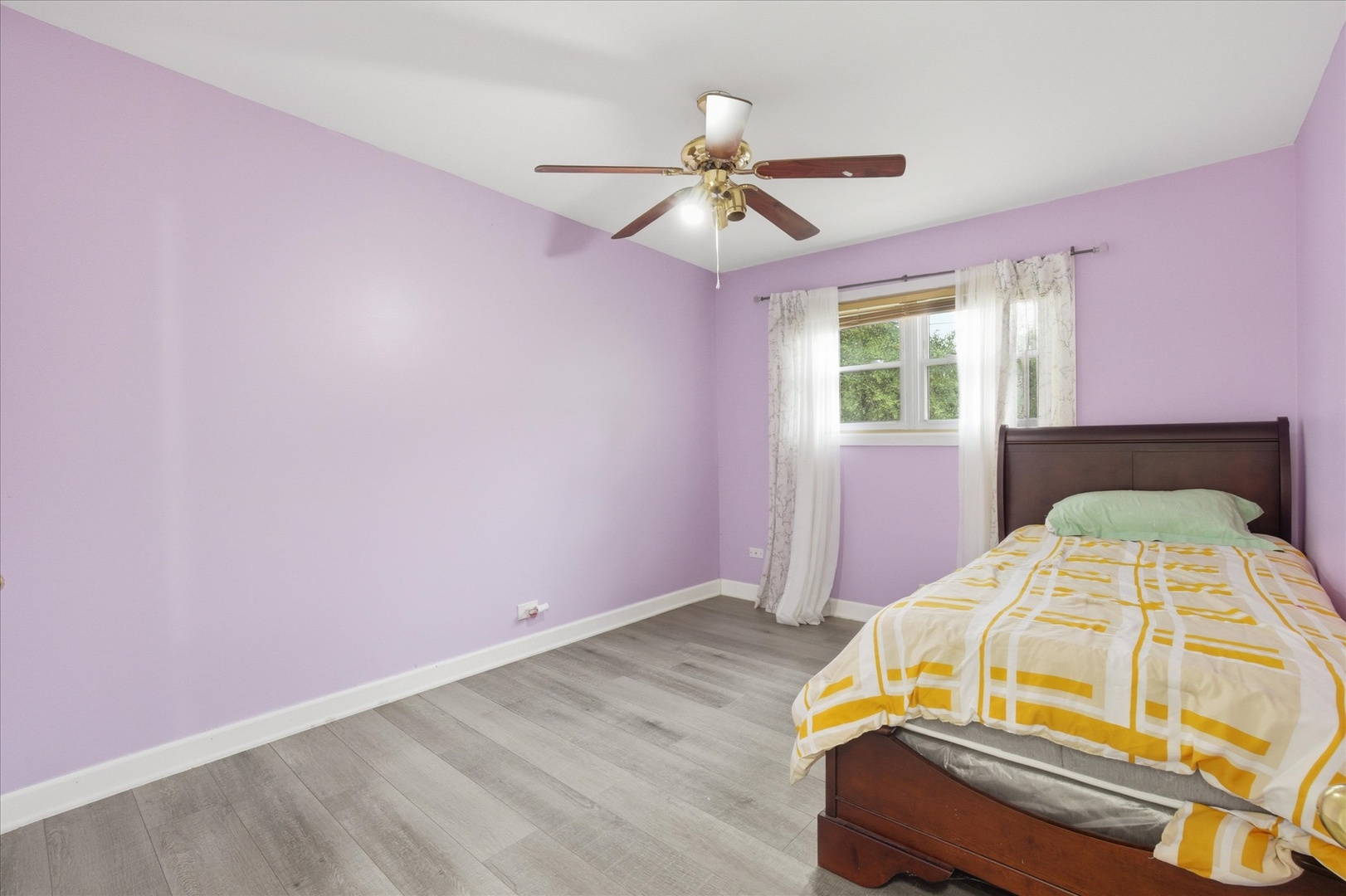1582 Pennsylvania Avenue Des Plaines, IL 60018 - Photo 18 of 28 a bedroom with a bed and a chandelier